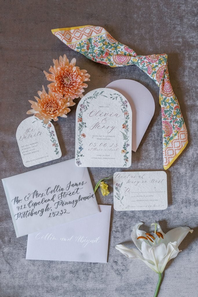 Whimsical garden wedding invitations printed on seed paper and hand done calligraphy addressing