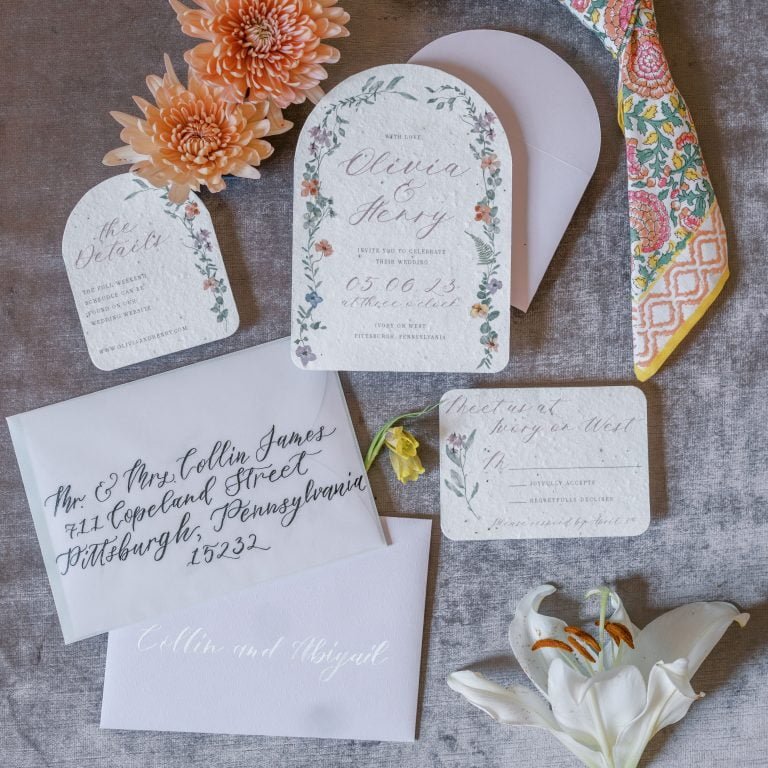 Whimsical garden wedding invitations printed on seed paper and hand done calligraphy addressing