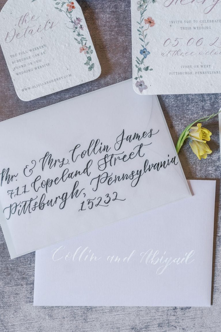Whimsical garden wedding invitations printed on seed paper and hand done calligraphy addressing