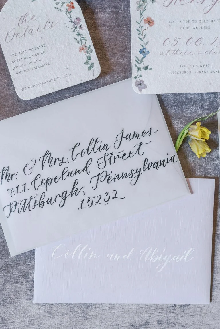 Whimsical garden wedding invitations printed on seed paper and hand done calligraphy addressing