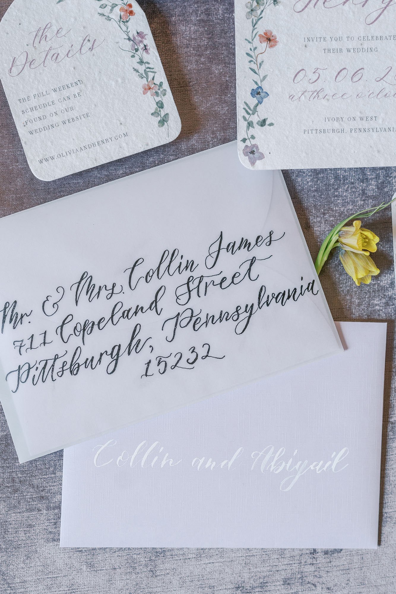 Whimsical garden wedding invitations printed on seed paper and hand done calligraphy addressing