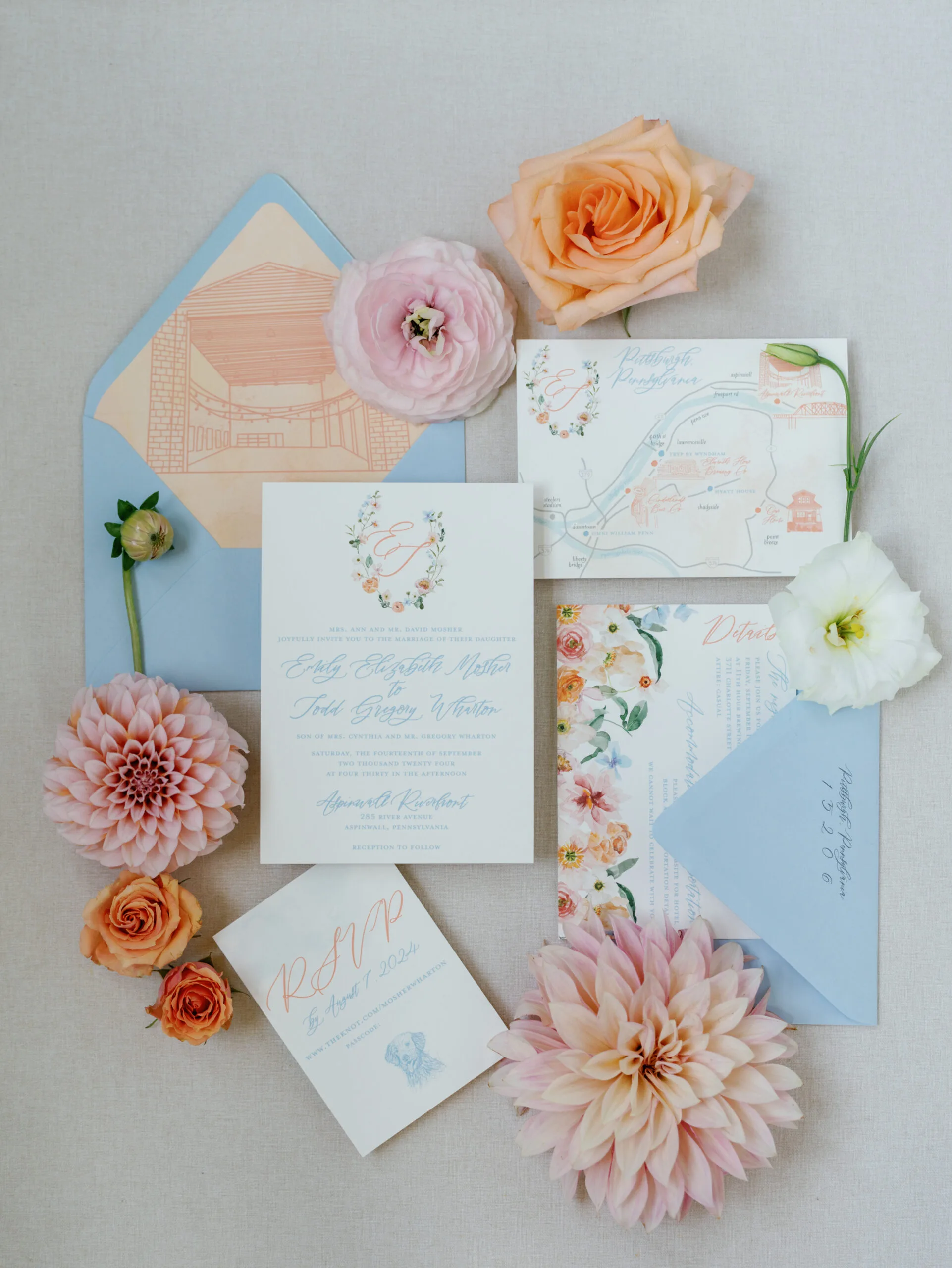Wedding stationery flatlay showing detailed suite with upgraded paper and thoughtful embellishments like envelope liner